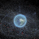 Computer image showing distribution of space debris in orbit around Earth.